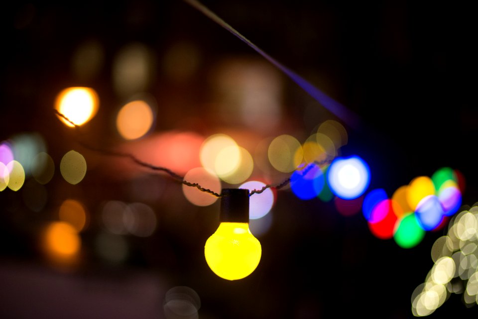 Defocused Image Of Illuminated Lights At Night photo