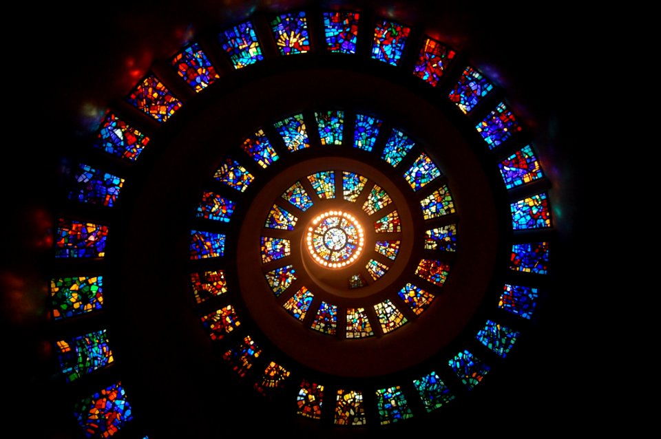 Worms Eye View Of Spiral Stained Glass Decors Through The Roof