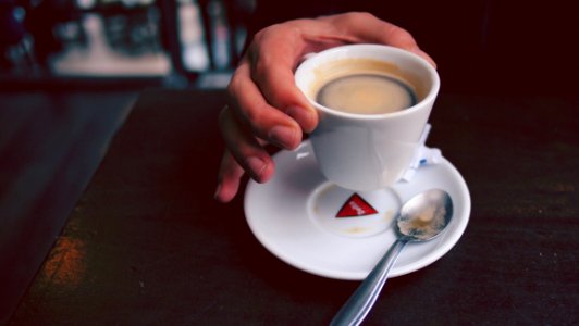 Person Holding Cup Of Coffee photo