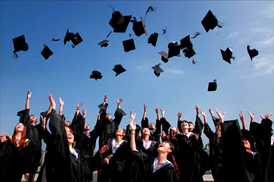 Graduates Throwing Mortarboards