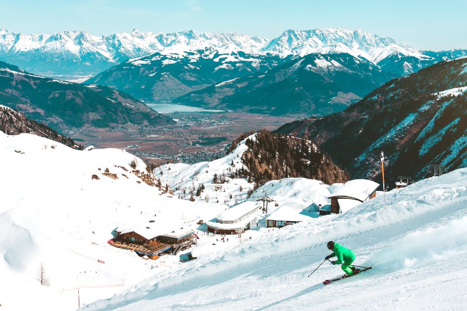 Skiier On Mountain Slopes photo