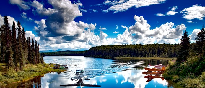 Floatplane Landing On Lake
