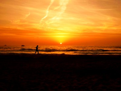Jogging On Beach At Sunset