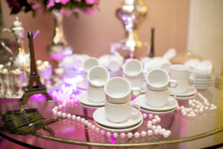 Ornamental Tea Set On Glass Table photo