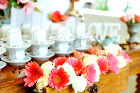 Set Of Coffee Cups And Flower Arrangement photo
