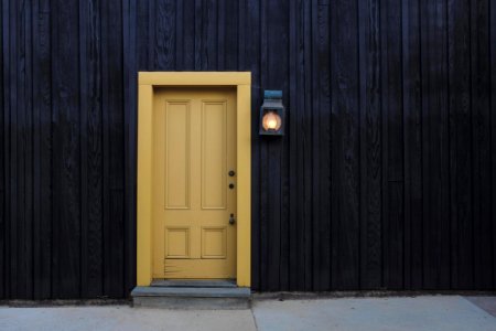 Wooden House With Yellow Door photo
