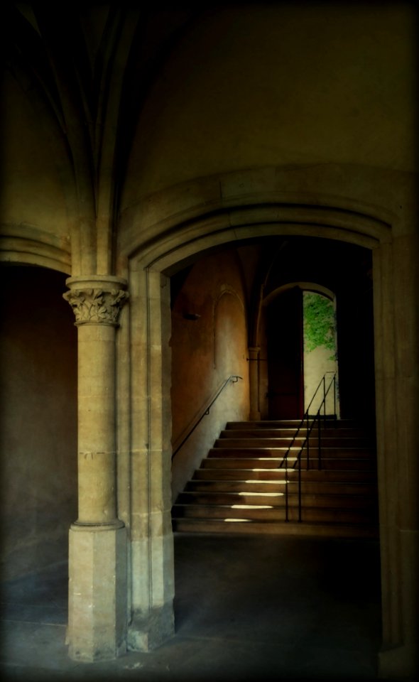 Beige Stone Stairway By Brown Door