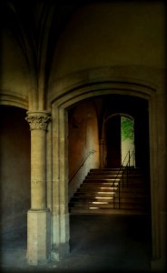 Beige Stone Stairway By Brown Door