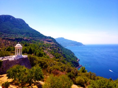 White Dome Terrace On Brown Cliff During Daytime