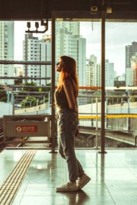 Woman Looking Through Window photo