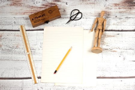 Paper And Pencil With School Supplies