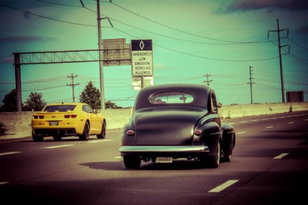 Classic Car On Highway photo