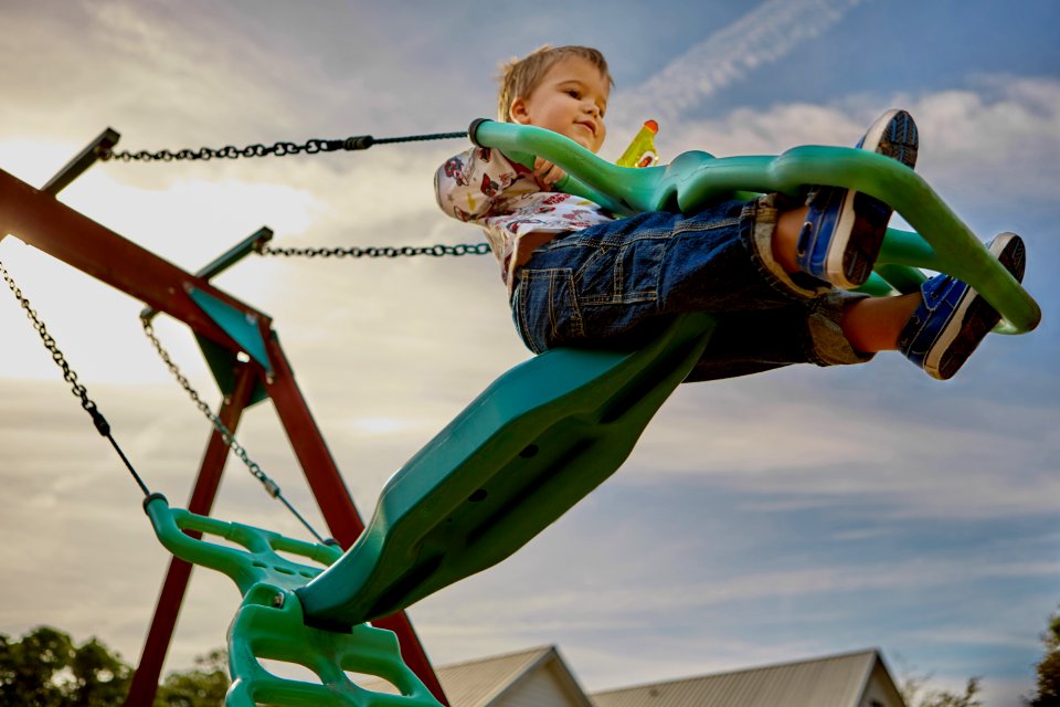 Child On Swing Set