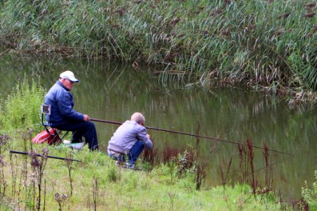 Grandpa Fishing With Kid