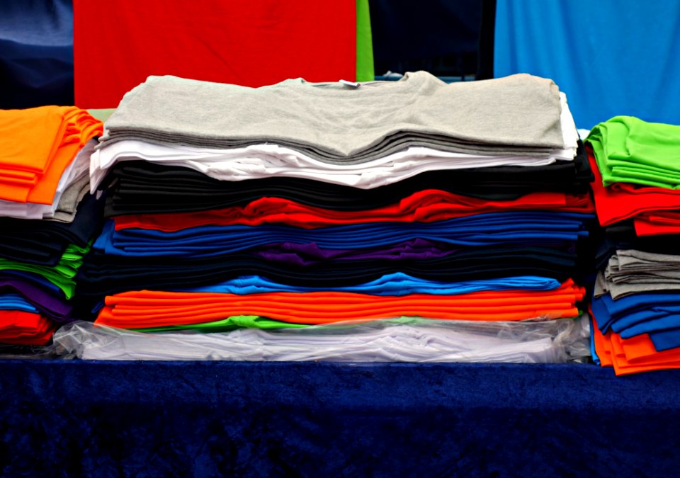 PUBLIC DOMAIN DEDICATION - Pixabay Digionbew 12 15-07-16 Pile Of Folded T-shirts LOW TES DSC06294