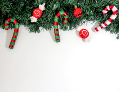 Close-up Of Christmas Decorations Hanging On Tree photo