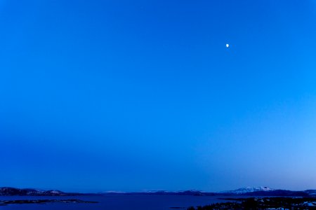 Moon In Blue Sky