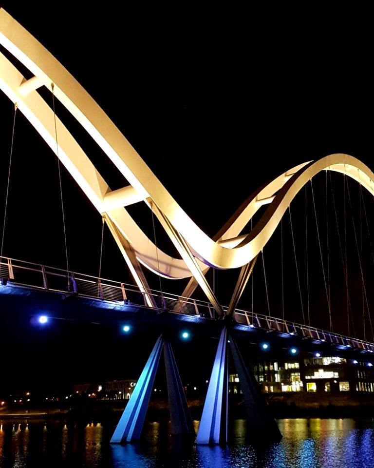 Modern Bridge Illuminated At Night