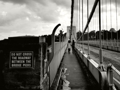 Pedestrians On Bridge
