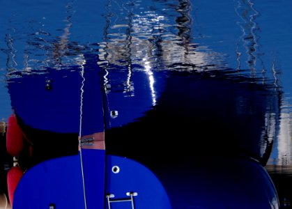 Ship Reflecting In Water