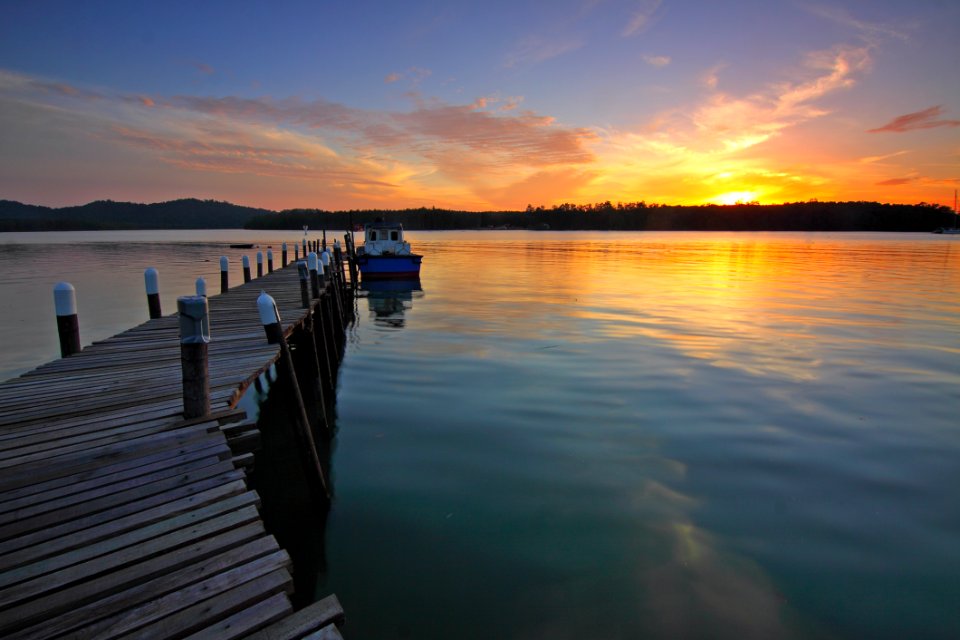 Wooden Pontoon At Sunset