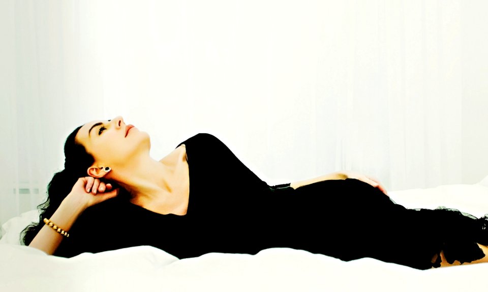 Woman In Black Dress Lying