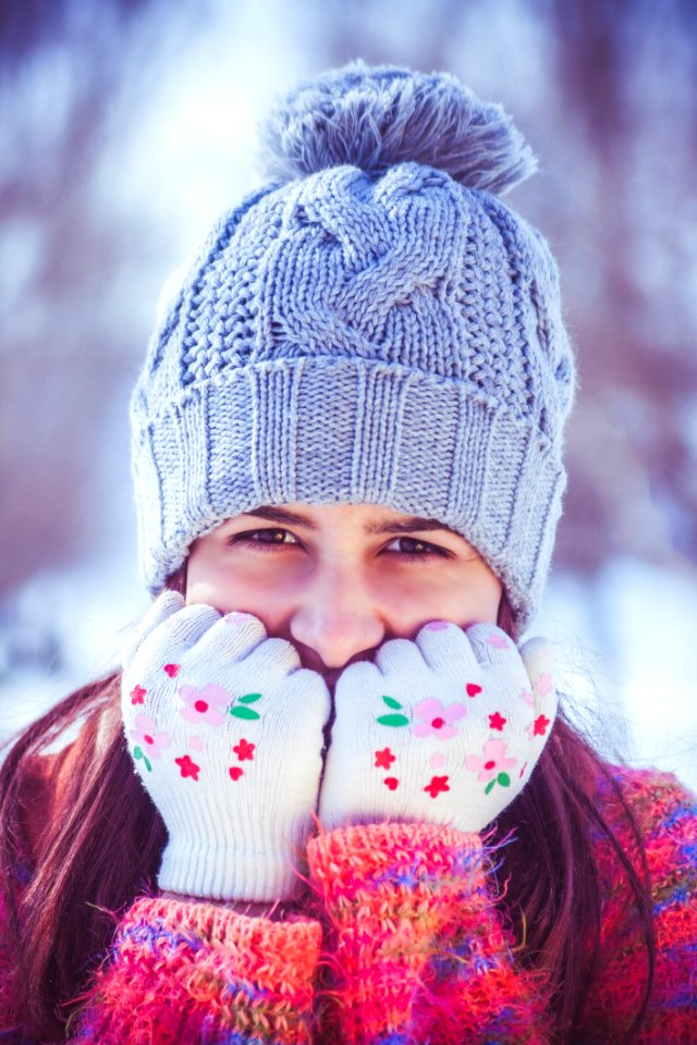 Portrait Of Girl In Tea Cozy Hat photo