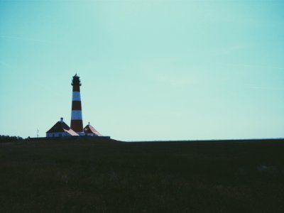 Lighthouse On Open Landscape