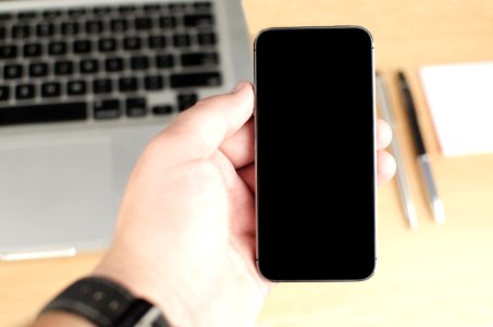 Person Holding Smartphone