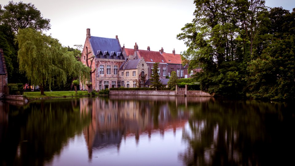 Reflection Of Houses In Lake photo