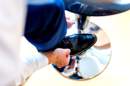 Man Tying Shoelaces