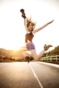 Woman Jumping On Highway