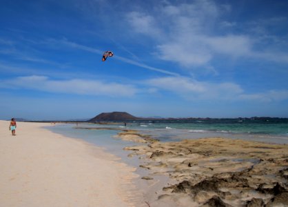 Flying Kite Above Sandy Beach
