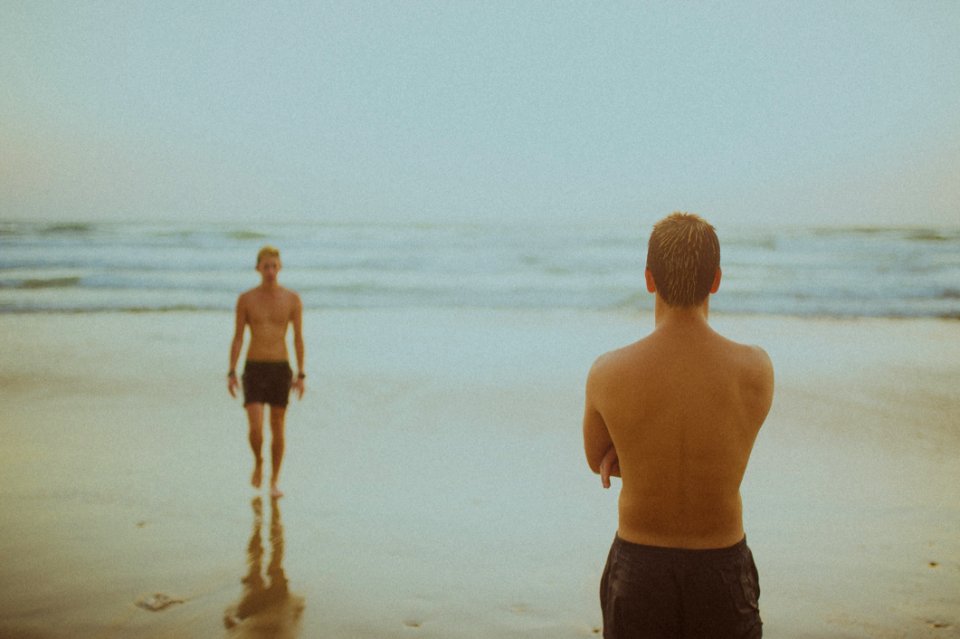 Swimmers On Wet Beach photo