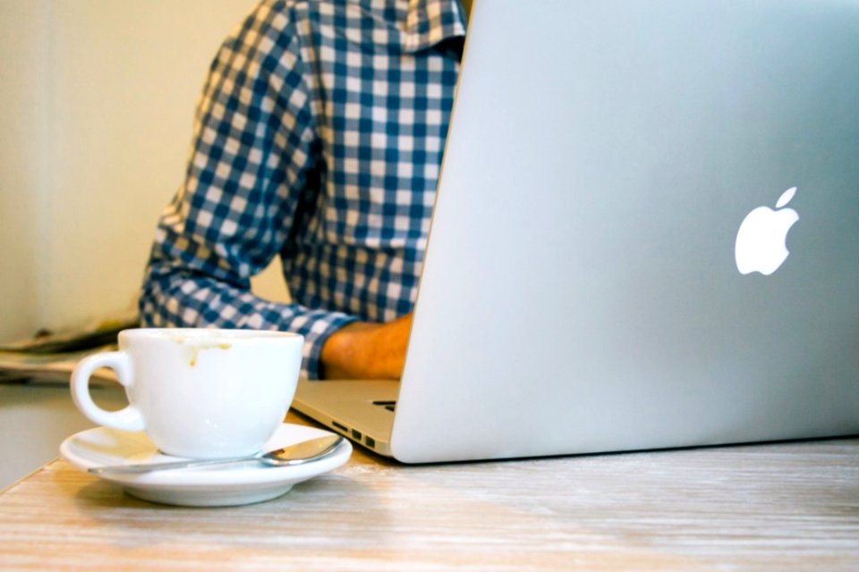 Businessman Coffee And Macbook Pro