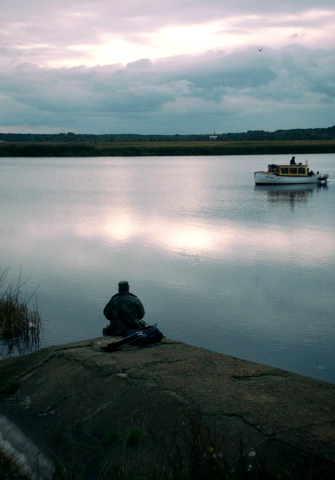 Fisher And Boat