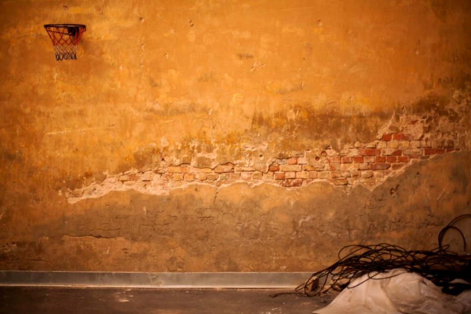 Old Wall With Basketball Ring