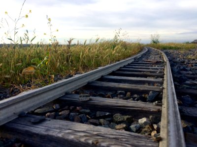 Railroad Track Against Sky photo