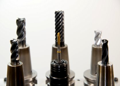 Close Up Photo Of Black Metal Drill Bit