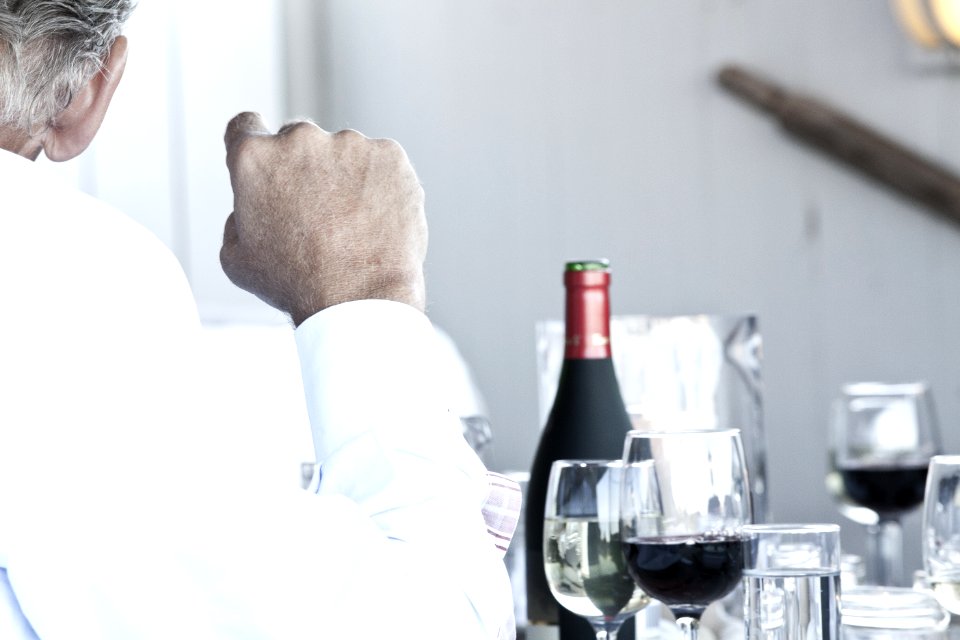 Man Sitting At Table
