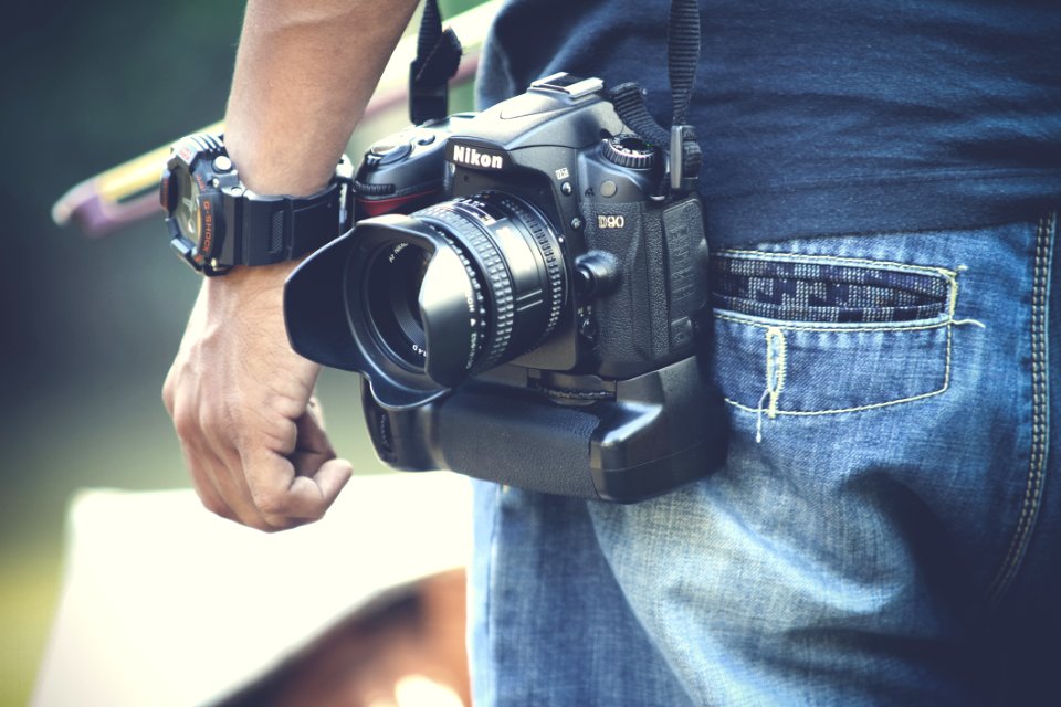Photographer With Camera
