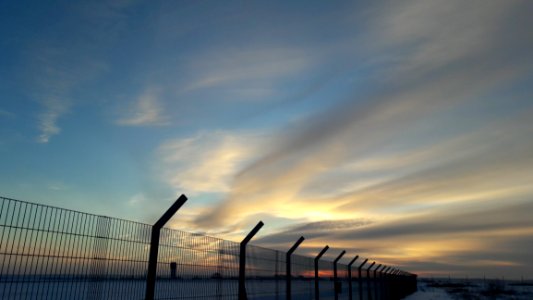 Clouds Above Fenceline