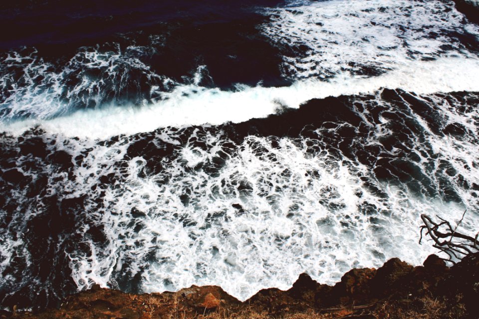 Cliff Side View Of Ocean Waves