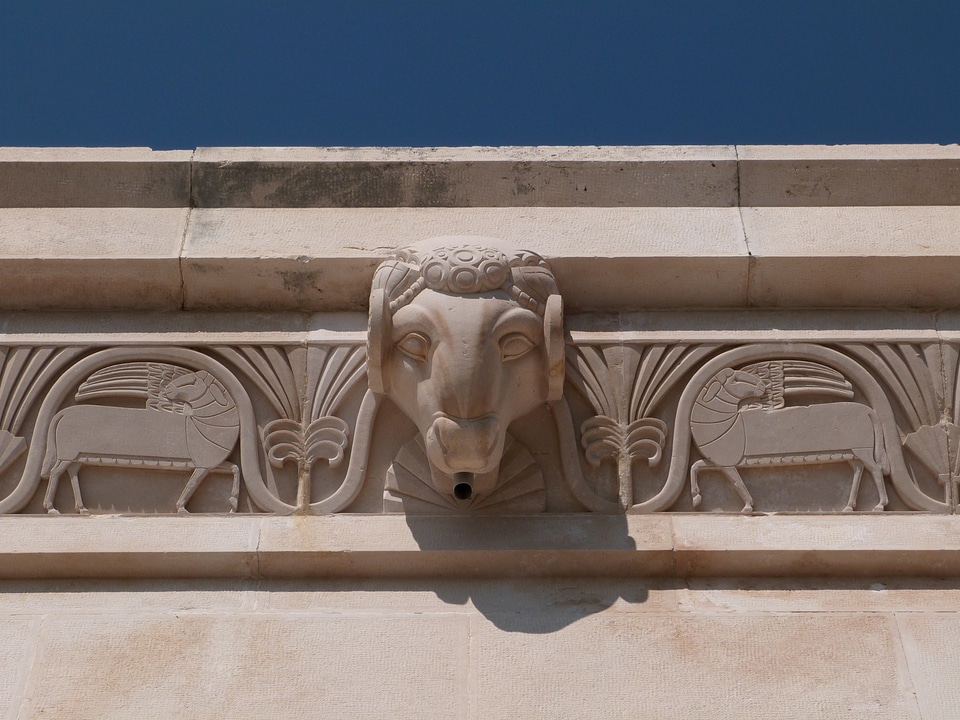 Mausoleum stone head