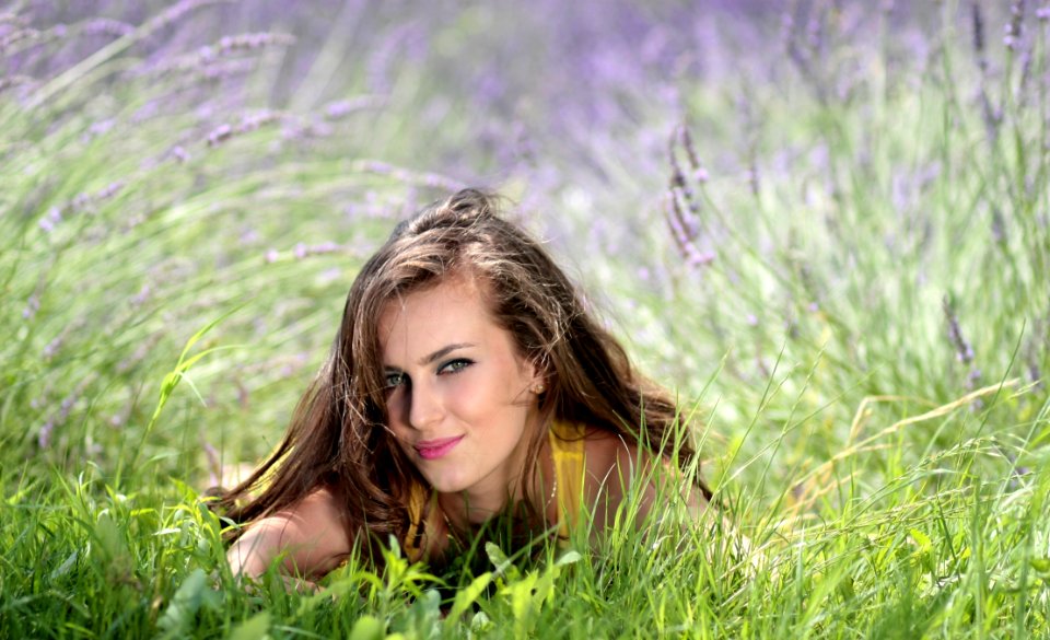 Beautiful Woman On Grass