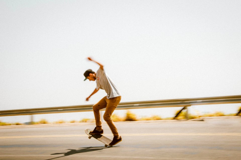 Male Skateboarder On Road