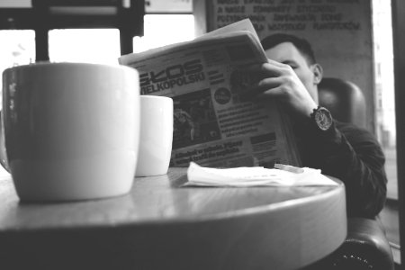 Man Reading Newspaper photo