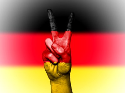 V Sign And Flag Of Germany