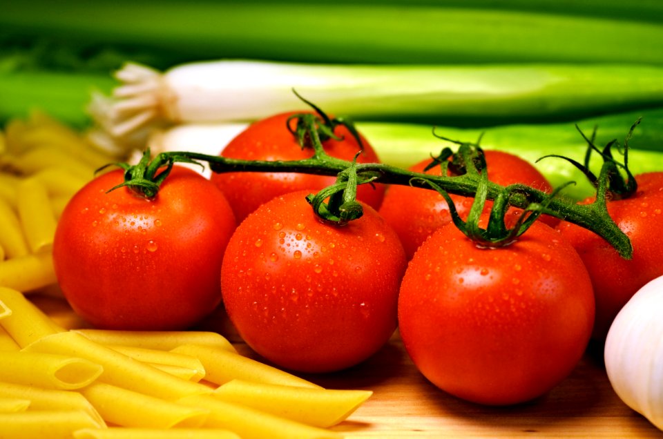 Close Up Photo Of Red Tomatoes Near Pasta