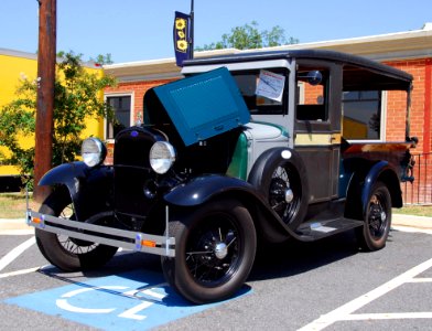 Vintage Auto In Handicapped Parking Space photo